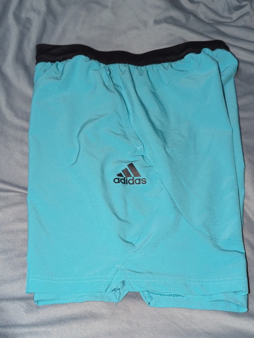Adidas Men's Aeroready Axis Woven Training Shorts in a light blue colorway.